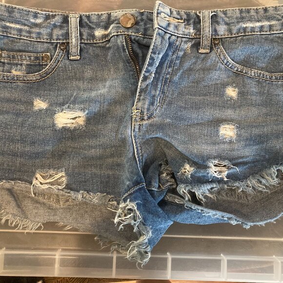 Free People Pants - Free people distressed shorts. Size 25